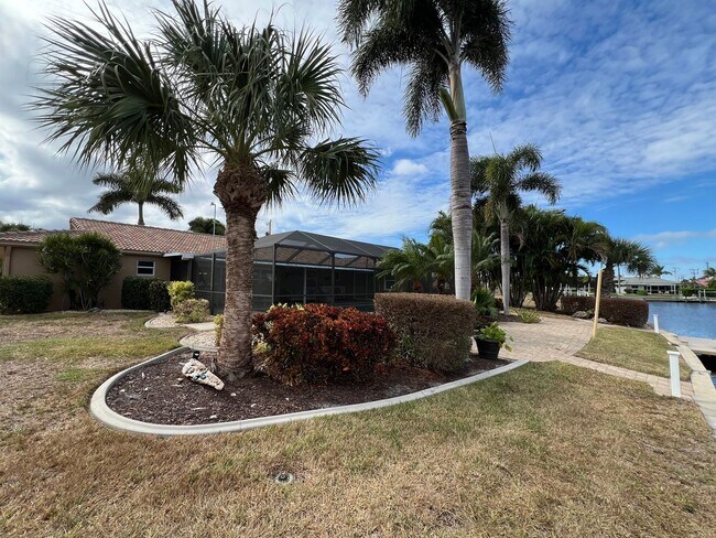 Building Photo - Furnished ** Punta Gorda Isles Vacation Home ** Heated Pool ** Canal / Boat Dock ** $6,500