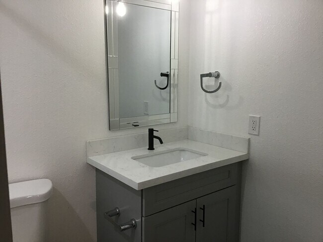 Building Photo - Corner Unit Townhome with Style and Substa...