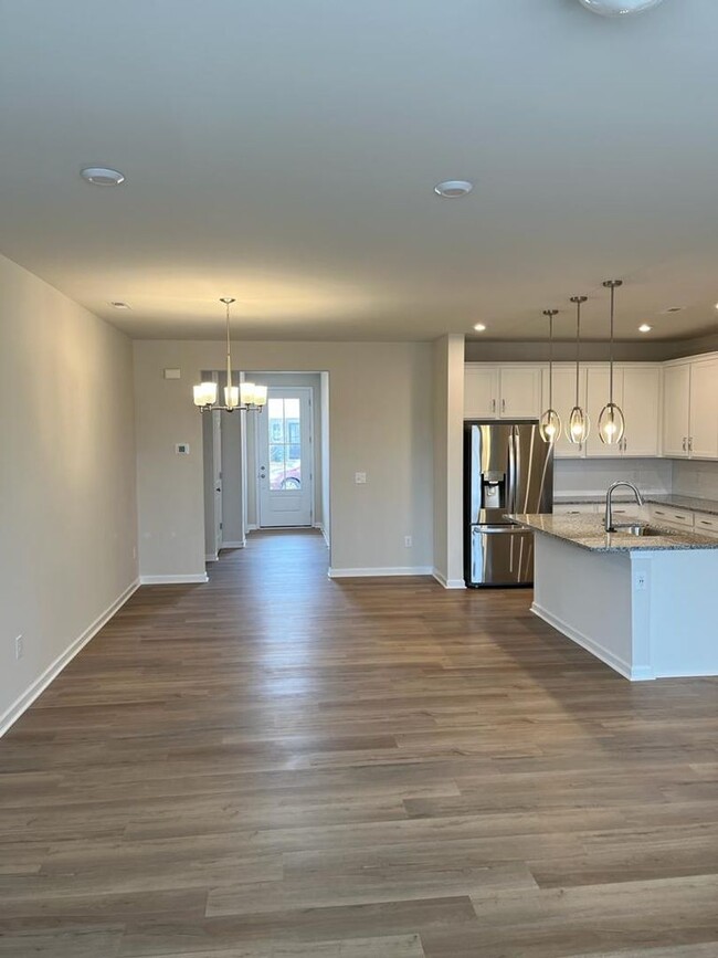 Building Photo - Townhome with 3BR/2.5BA Garage Located in ...