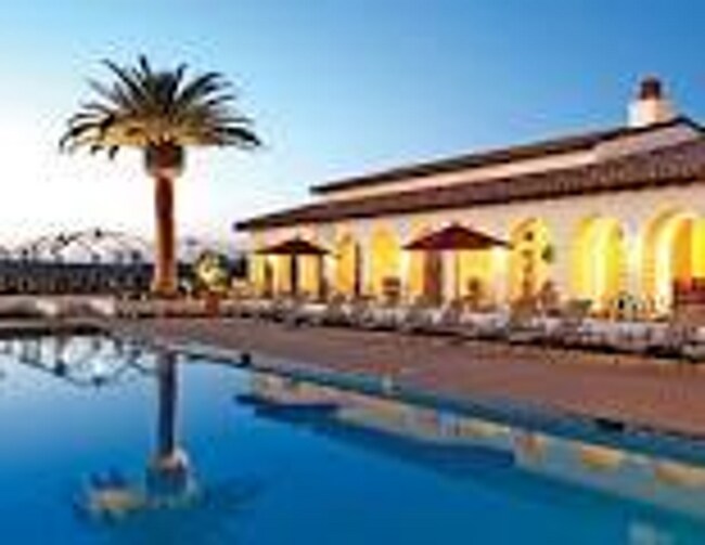 Building Photo - COASTAL LIVING IN A COUNTRY CLUB ENVIRONMENT.