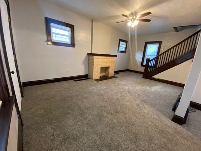 Building Photo - Updated 4-Bed with Porch & 2-Car Garage on...