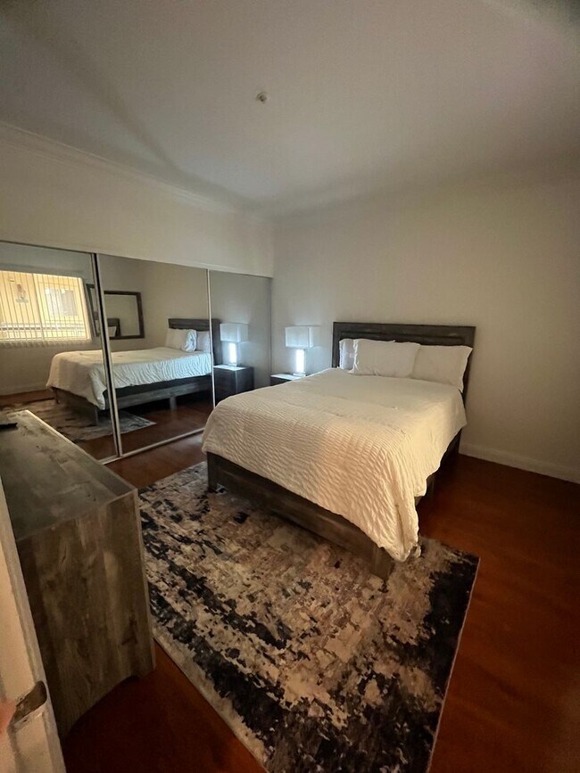 Building Photo - Meridian  Fully FURNISHED Condo with Strip...