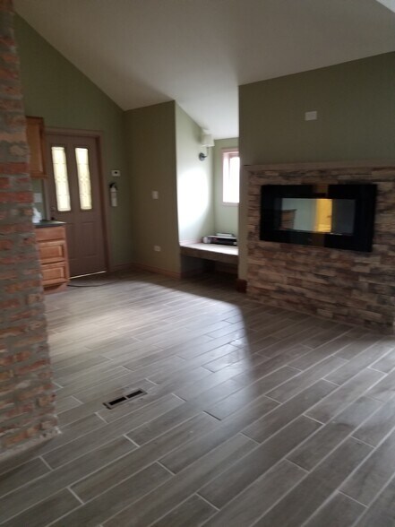 front room kitchen area - 211 E 161st Pl