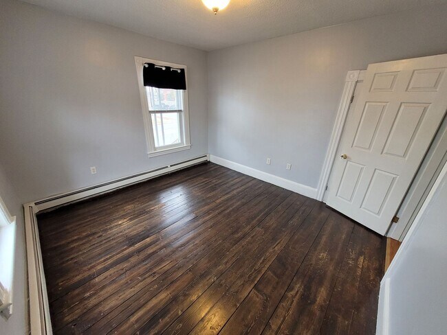 Building Photo - $2350 - 3 Bed / 1 Bath Condominium in Manchester's Somerville Neighborhood with 2 Car Off-Street ...