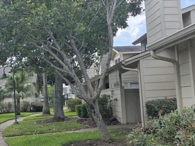 Building Photo - Beautifully Updated 2BR/2BA with Loft Oasis – Safe & Gated Community