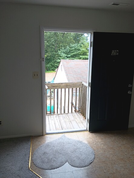 View of the entrance door from the living room. - 1331 N Black Horse Pike