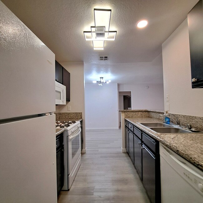 Building Photo - Spacious, Stylish Living in a Guard-Gated West Las Vegas Community in The Lakes with Resort-Style...