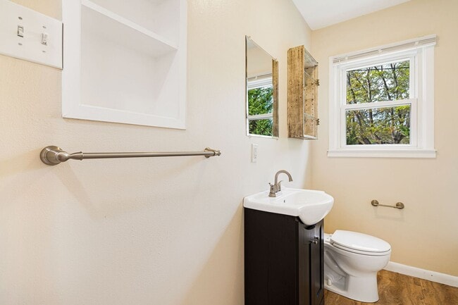 Building Photo - Sunny 2-Bedroom Home with Fenced-In Yard a...