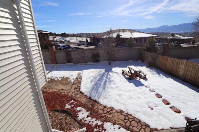 Building Photo - Spacious 4-Bedroom Home with Open Concept Living, Mountain Views & Fenced Yard