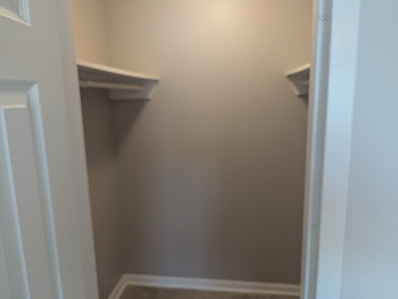 Main walk-in closet - 200 Sanders Ferry Rd