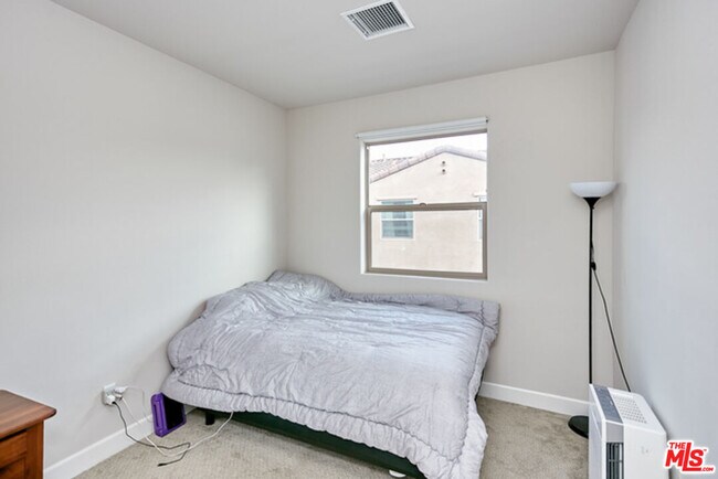 Building Photo - 9831 Alburtis Ave
