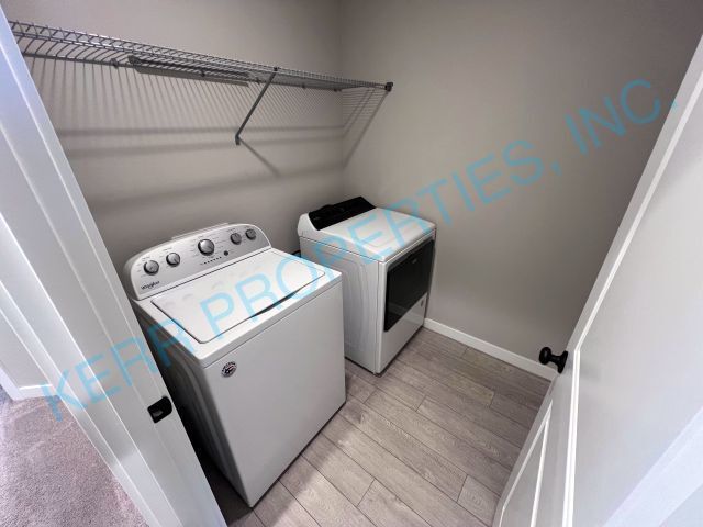 Building Photo - FREE RENT! Modern townhome living 3-Bed Retreat with 2.5 Baths in Serene Happy Valley!