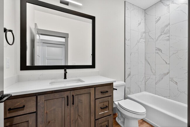 Building Photo - MUST SEE TOWNHOMES IN AMMON RIGHT OFF BEAC...