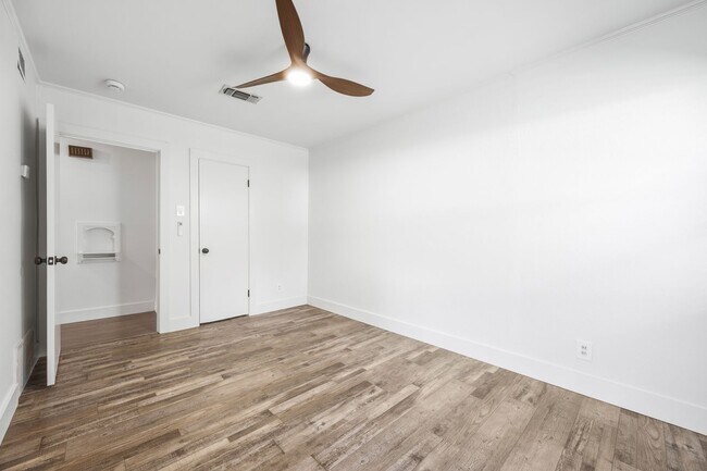 Building Photo - **$40K+ IN UPGRADES AND A FENCED BACKYARD WITH TWO STORAGE BUILDINGS**