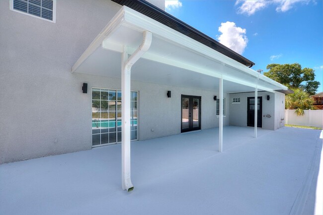 Building Photo - Rare Luxury Lease Opportunity | Spectacular 5-Bedroom Pool Estate on Nearly ¾ Acre Near Gulf Beaches