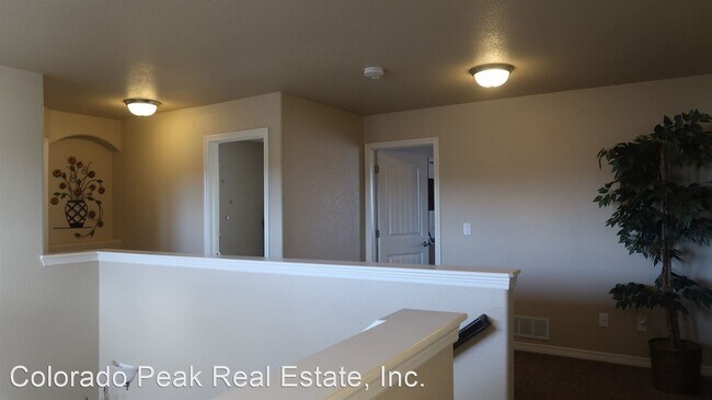 Building Photo - 4 br, 3 bath House - 7874 Pinfeather Dr