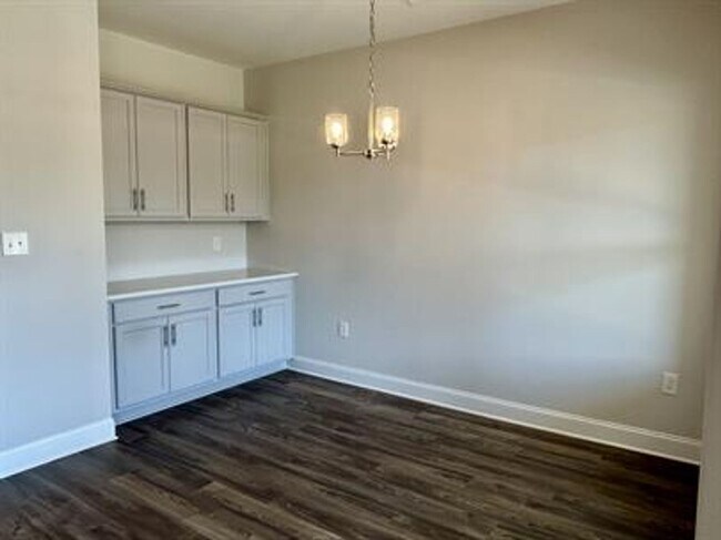 Building Photo - Relax & Unwind in This Peaceful 4 Bedroom ...