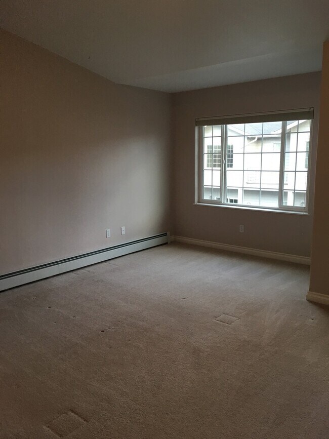 Building Photo - Charming Comfort: A Welcoming and Practical 2-Bedroom Townhome with Garage