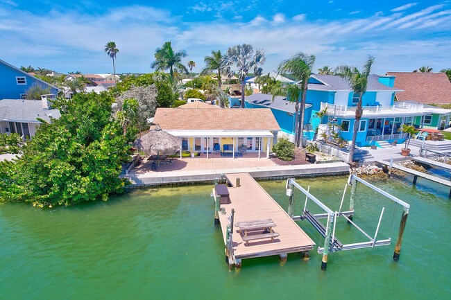 Building Photo - Waterfront 3BR/2BA Home – Walk to Beach + Boat Lift – $500 Off!