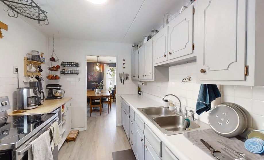 Walk through kitchen to living space 2 - 1101 S Cottage Grove Ave