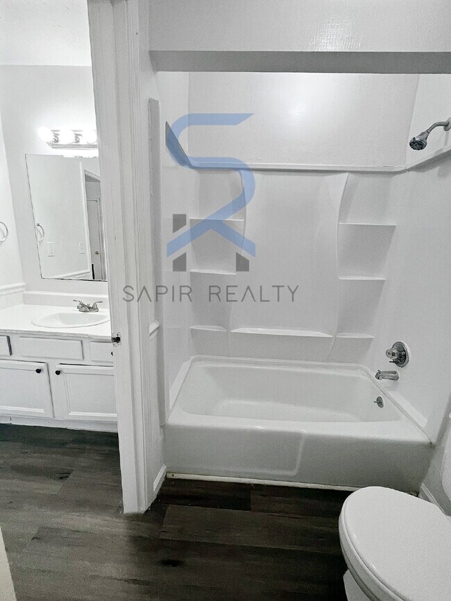 Building Photo - Move in before December 15th and choose your reward: a $250 Amazon Gift Card or a 55" Smart TV!