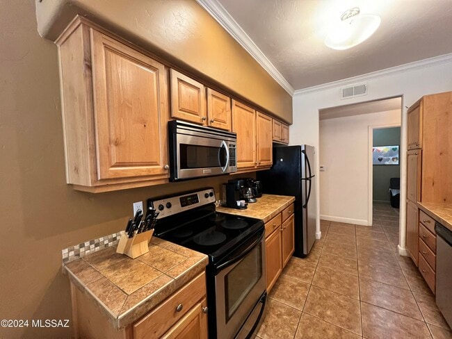 Building Photo - 7050 E Sunrise Dr