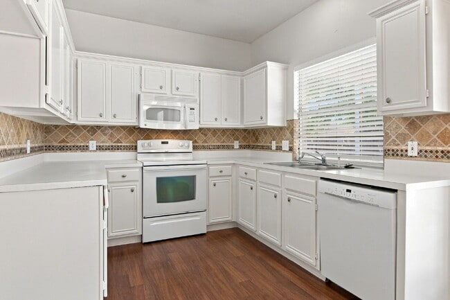 Building Photo - "Spacious Two-Story Home with Multiple Living Spaces and and Expansive Backyard!"