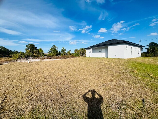 Building Photo - Brand-New Modern 2BR/2BA Home with Garage on Oversized Lot – Prime SW Lehigh Acres Location