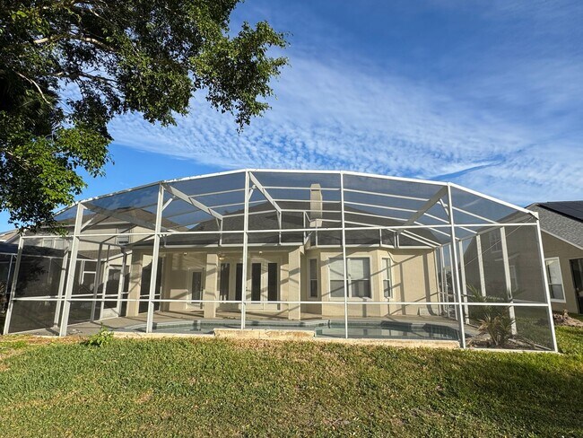 Building Photo - Spacious 4-Bedroom Home with Private Pool and Modern Comforts