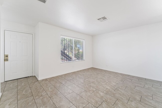 Building Photo - Modern Gated Condo Near the Strip with Pool & Covered Parking!