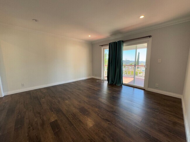 Building Photo - Large Open Layout Nestled in a Quiet Neighborhood with Stunning Mountain Views
