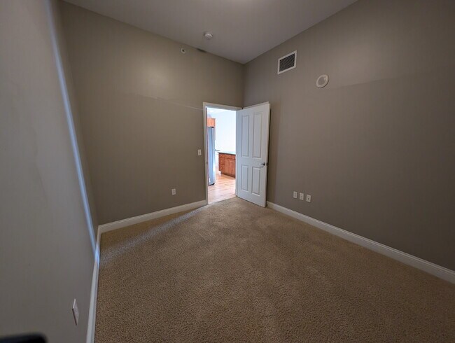 Building Photo - Chic Urban Living: Spacious 2-Bed Condo in Denver with 2 Reserved Garage Spaces!