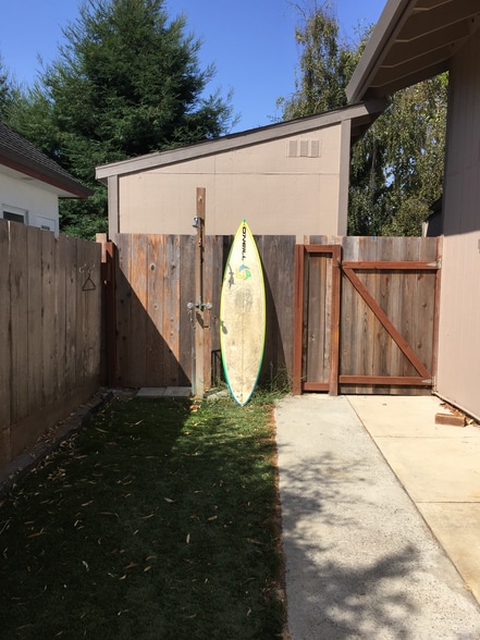 OUtdoor hot shower in fenced backyard - 681 37th Ave