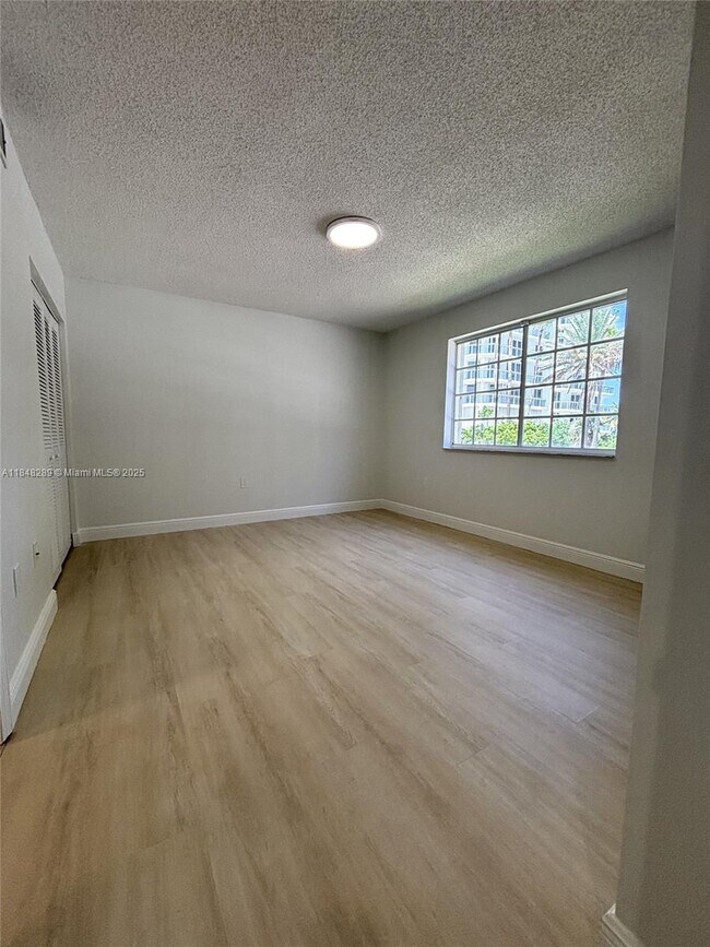 Building Photo - 8900 Collins Ave