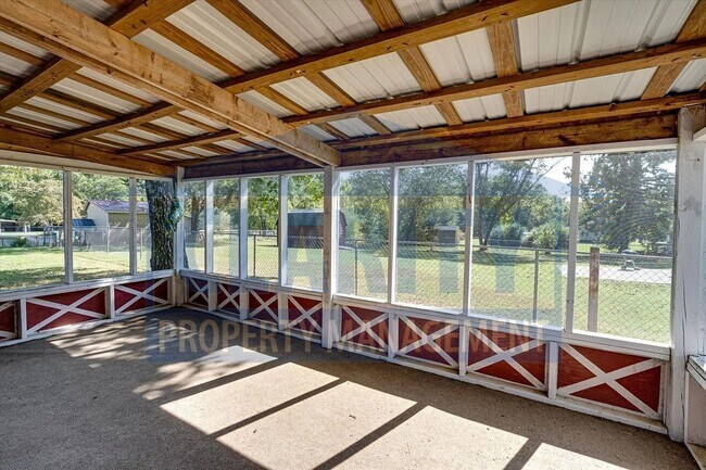 Building Photo - Updated house with carport and shed on corner lot!