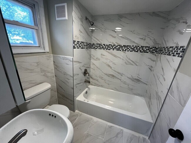 Building Photo - Renovated 2-Bedroom Home with Updated Kitchen & Backyard – Trenton NJ