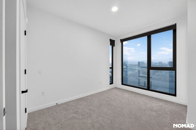 Building Photo - Act Fast: Luxury SoMa Corner Unit w/ EV Parking & Views