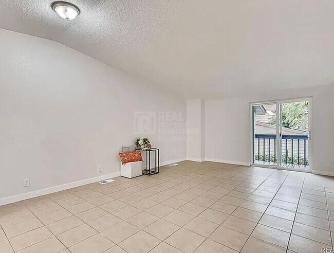 Building Photo - 7110 E 63rd Ave