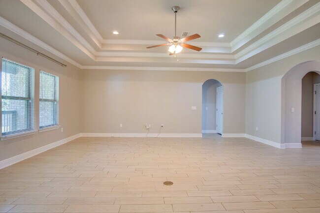 Building Photo - Spacious 4BR Pool Home with Modern Upgrade...