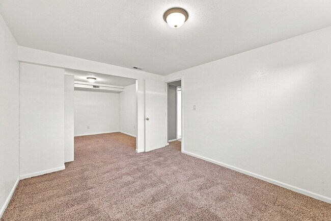 Building Photo - $2,195.95, 5-bed, 2.5-bathroom located in Colorado Springs with a fenced backyard.