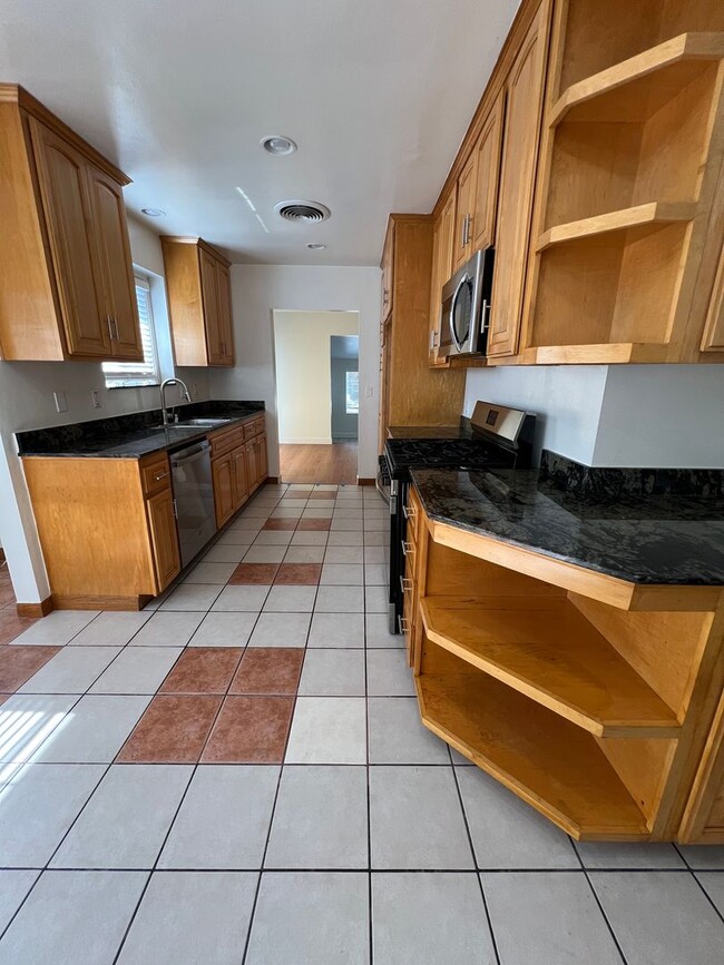 Building Photo - Freshly Renovated Gem with Incredible Floor Plan