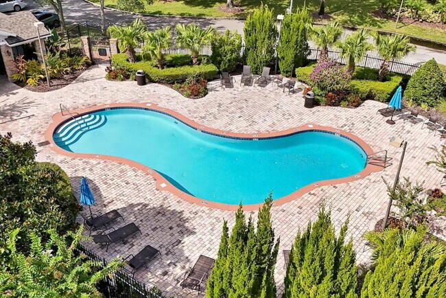 Building Photo - "Stunning 3BR Orlando Home with Private Screened Pool, Spa & Spacious Living Areas"