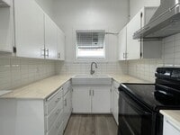 Building Photo - Updated 2 bedroom, large fenced back yard ...