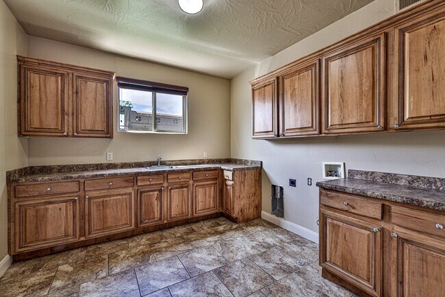 Building Photo - "Spacious 4-Bedroom Retreat with 3,584 Sq ...