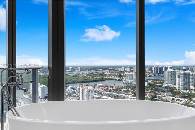 Building Photo - 15701 Collins Ave