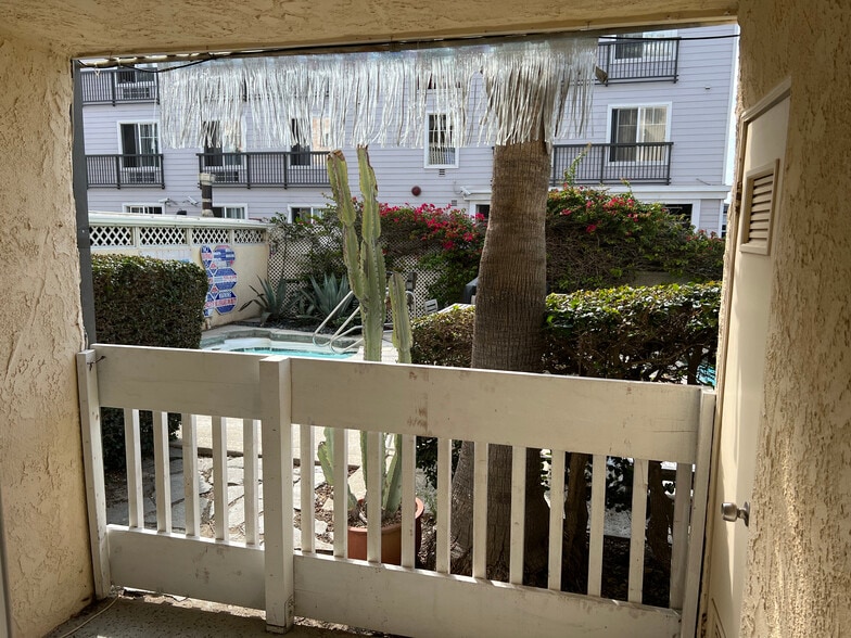 Private back patio that opens into common back patio - 22 Navy St