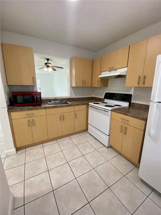 Building Photo - 8740 N Sherman Cir