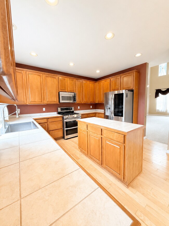 Building Photo - Spacious 4-Bedroom Home with Bonus Room, Trex Deck & Pergola in Prime Maple Valley