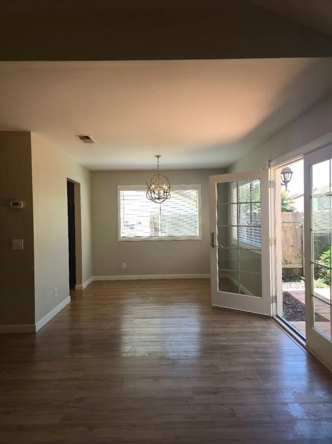 Building Photo - Light-Filled End Unit Condo, 2BD/2.5BA wit...