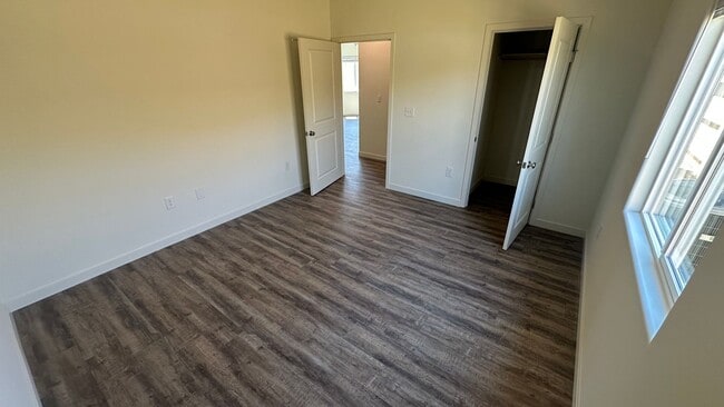 Building Photo - Coyote Run Duplexes 6000